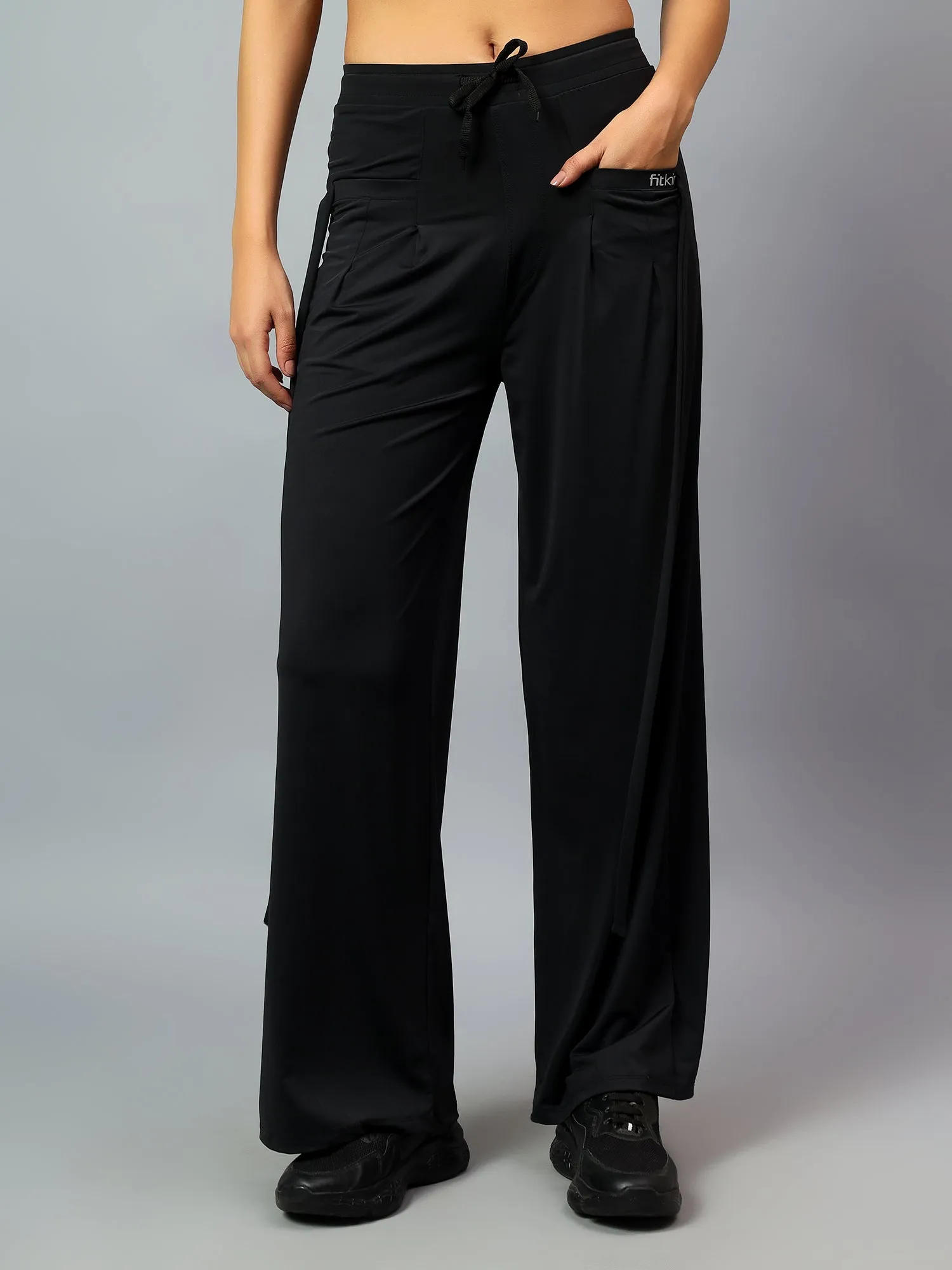 Fitkin Women's Black Relaxed Fit Pleated Bootcut Trackpant