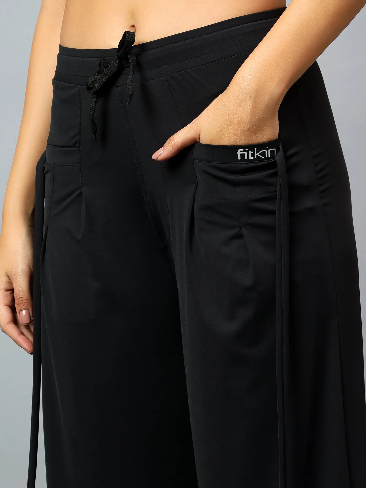 Fitkin Women's Black Relaxed Fit Pleated Bootcut Trackpant